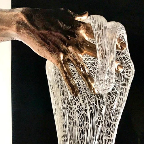 bronze hands and dripping glass by Jake Pfeifer and Miles Van Rensselaer