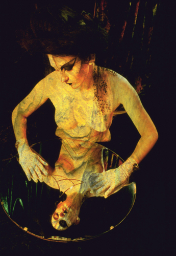 surreal image of a woman and mirror