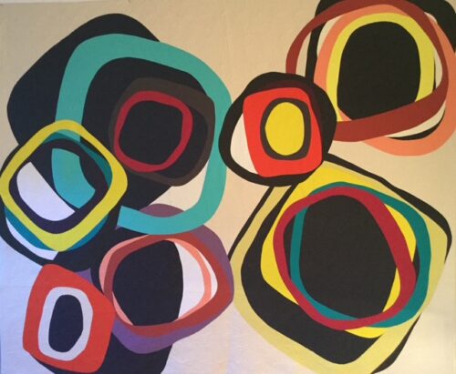 colorful geometric handmade quilt