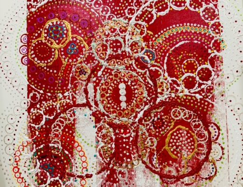 Bold red abstract art with circular patterns