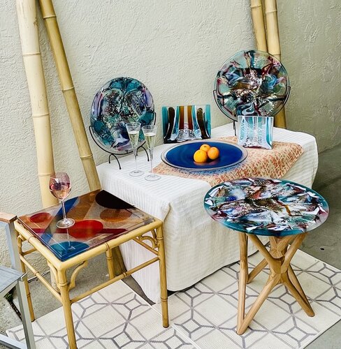 display grouping of fused glass sculpture and tables