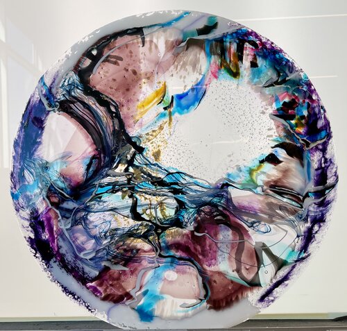 Handmade fused glass disc in many colors