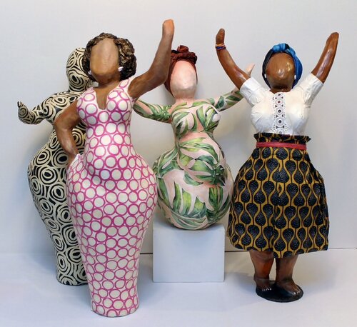 papier-mâché figures in African dress