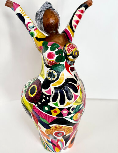 papier mache sculpture of an African woman