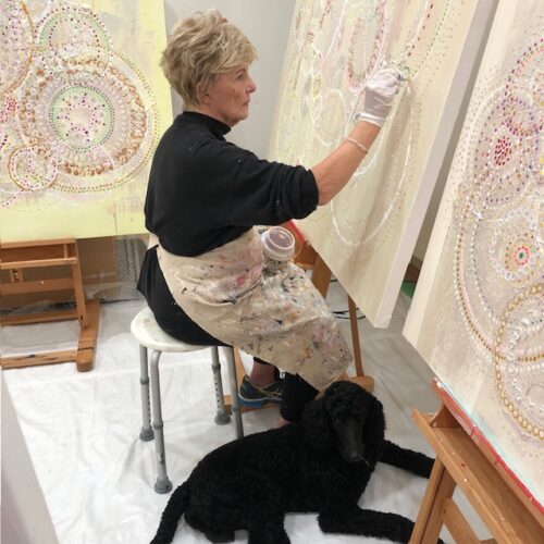 artist Donna Wise working in her studio
