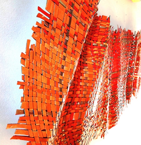 side angle view of "Firestarter" woven sculpture
