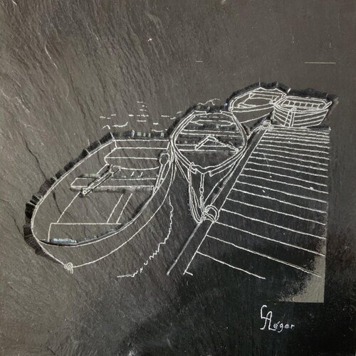 boat design on bas relief carved slate