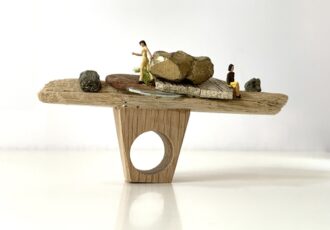 mixed media whimsical ring with figures and rocks
