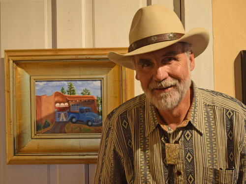 plein air artist Jack MacGowan with his painting