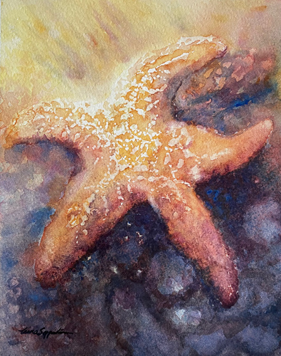 watercolor painting of a starfish on the beach