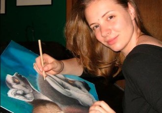 Colored pencil artist Corrina Thurston at work. This inspirational entrepreneur started a business despite severe health and energy limitations. She offers tips for others, at www.ArtsyShark.com