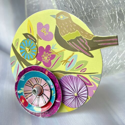 bird themed pin made with tin collage