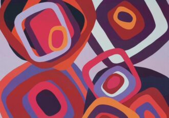 colorful handmade art quilt with geometric circles