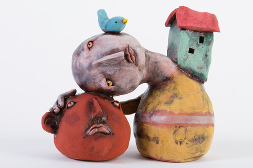 whimsical sculpture in clay