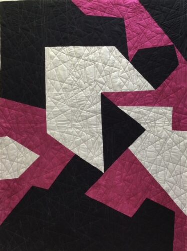 handmade quilt using color blocks