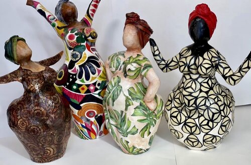 group of papier mache sculptures of African American woman